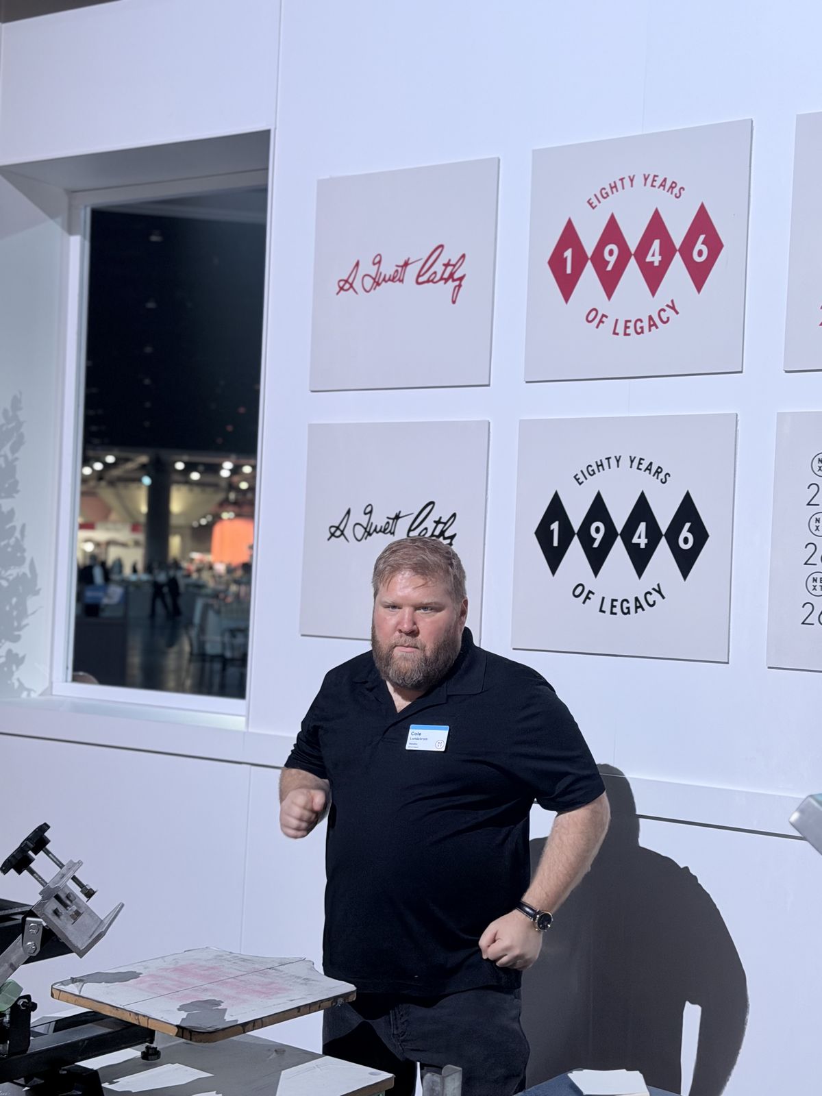 Guests watching custom merch get printed live at a Cincinnati event